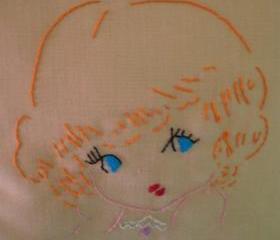 Hand embroidered vintage inspired portrait cushion.
