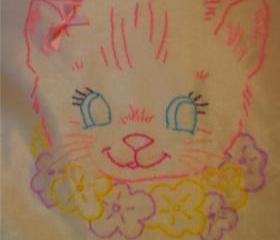 Hand embroidered vintage kitten cushion.